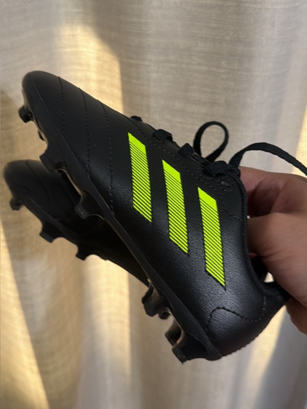 adidas Black Cleats with Neon Yellow Stripes